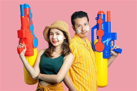 Young Asian Couple in Summer Outfits with Water Guns for Songkran ...