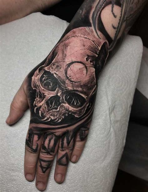 Skull Tattoos - Tattoo Insider | Hand tattoos, Skull tattoos, Finger ...