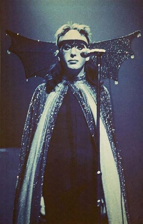 Peter Gabriel performing with Genesis in his bat costume 70's | Peter ...