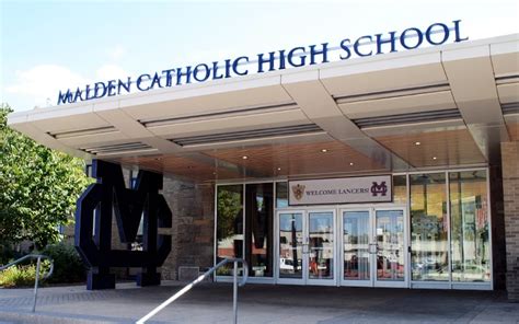 Attractive Temporary Containment Wall for Malden Catholic High School