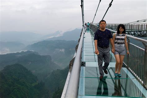 Panels on Chinese glass bridge fall out during gale-force winds ...