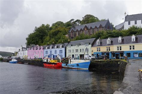 Portree Harbour in rain editorial stock image. Image of town - 169117799