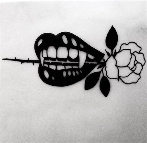 Black-ink vampire mouth keeping a rose stem in teeth tattoo design ...