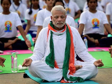 On Yoga Day, PM Modi to perform asanas with 60,000 enthusiasts in ...