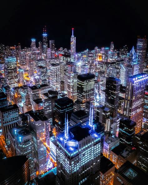 Aerial View Of City Buildings At Night · Free Stock Photo