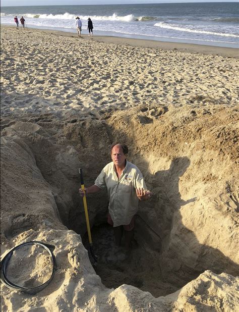 17-year-old dies after sand dune collapses into hole at Outer Banks ...