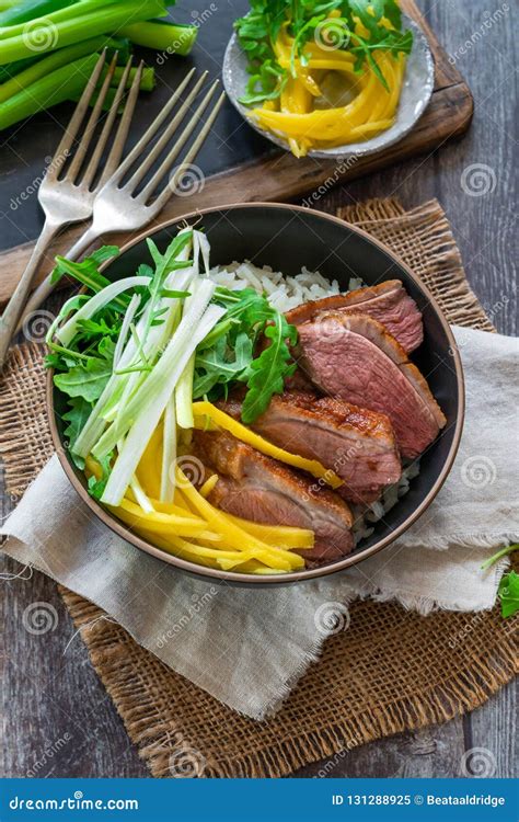 Hoisin Duck with Mango, Spring Onion, Rocket Lettuce Salad and Rice ...