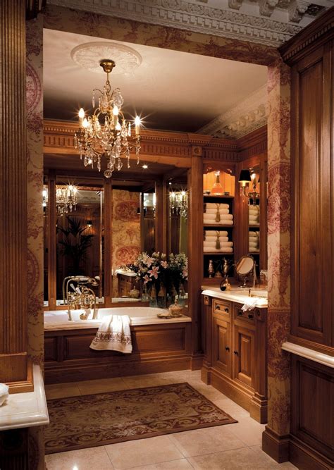 a fancy bathroom with chandelier and bathtub