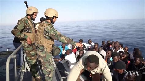 Libyan Coast Guard Threatens NGO Rescue Ships in Mediterranean - YouTube