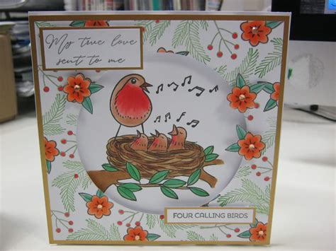 Four Calling Birds - a Christmas aperture card featuring a robin's nest