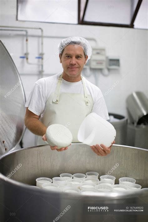 Goat farmer making cheese — portrait, occupation - Stock Photo | #167649920