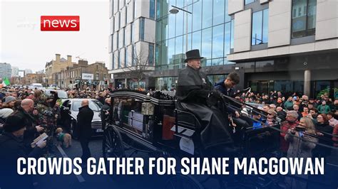 Shane MacGowan funeral: Huge crowds gather to watch procession - World News