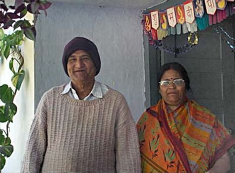 Dhoni's parents test positive for COVID-19 - Rediff Cricket