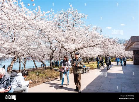 Washington DC, USA - April 5, 2018: Tourists people walking by Franklin ...