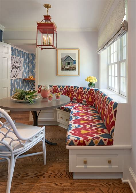 Washington, DC, breakfast nook with bright red lantern and ikat ...