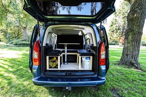 Simple kit turns small vans or crossovers into cozy micro campervans ...