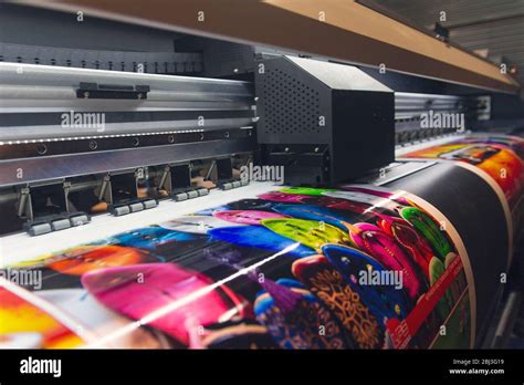 Large format printing machine in operation. Industry Stock Photo - Alamy