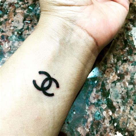 Chanel Tattoo with Husband's Initials