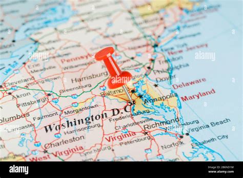 Red clerical needle on the map of USA, South Washington, DC and the ...