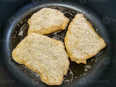 breaded wiener schnitzel with side dishes 24056079 Stock Photo at Vecteezy