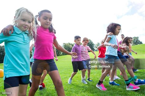 Three Legged Race High-Res Stock Photo - Getty Images