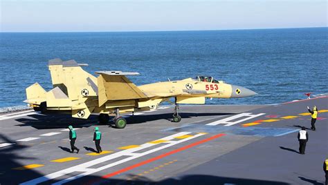 Shenyang J-15 Fighter Being Directed to Parking Aboard Carrier | Navy ...