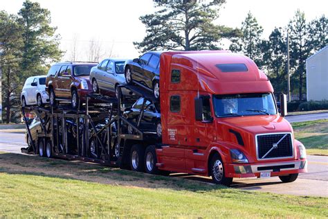 Volvo 780 VNL semi truck with 9 car carrier trailer loaded… | Flickr