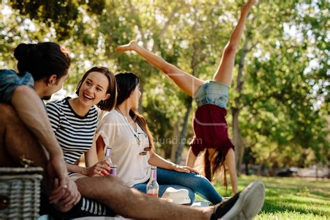 Young people enjoying picnic in park – Jacob Lund Photography Store ...