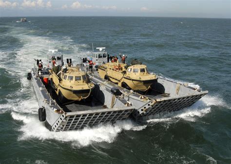 The Spis News: Two landing craft mechanized (LCM)