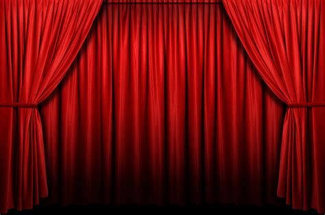 Red stage curtain with arch entrance | The Off Broadway Theatre