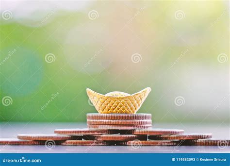 Chinese Gold Sycee or Yuanbao Boat Ingot on Stack of Coins Stock Image ...