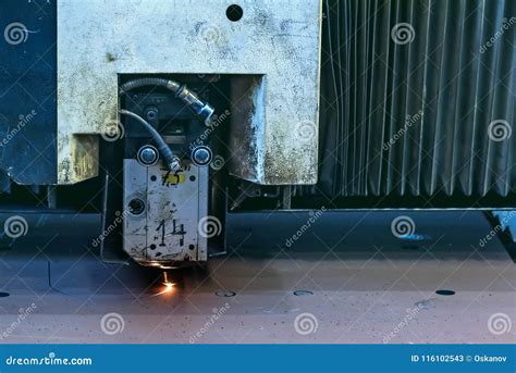 Laser beam cutting machine stock image. Image of flames - 116102543