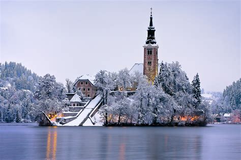 Photo Gallery: Lake Bled draped in winter white in the winter