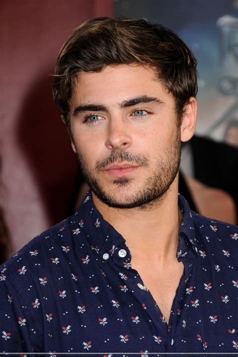 Zac Efron on the black carpet at the Rock of Ages premiere in Hollywood ...