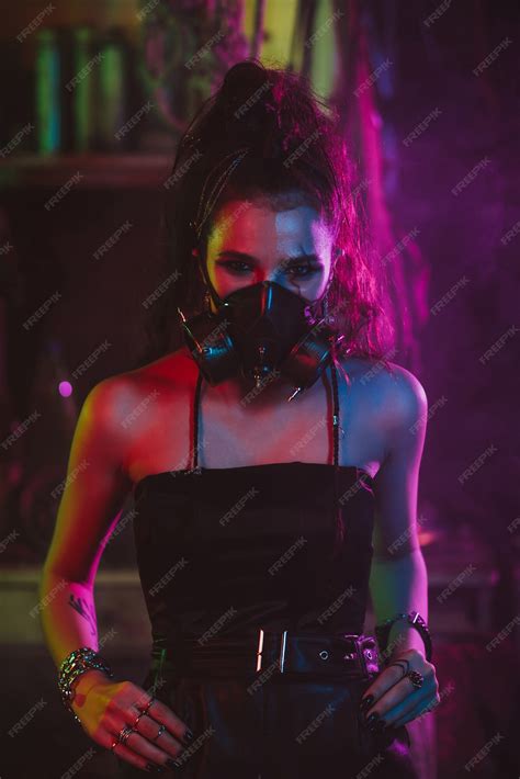 Premium Photo | Cyberpunk cosplay. a girl in a gas mask in a post ...