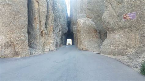 Driving Jeep Wrangler through the Needles Eye Tunnel in Custer State ...