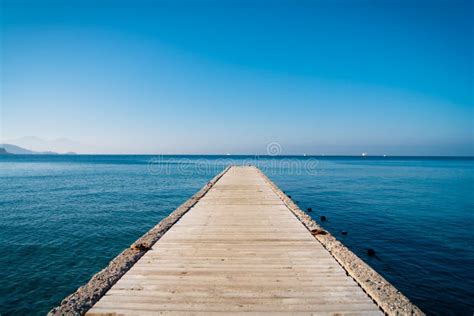 Pier and the sea stock image. Image of peaceful, wooden - 22186711