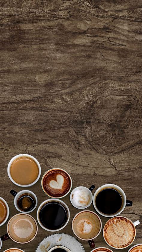 Assorted coffee cups on a natural wooden textured background | free ...