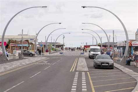 Police officers 'risk their lives' to rescue woman from sea in Skegness ...