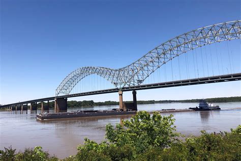 Mississippi River traffic resumes under damaged bridge | AP News