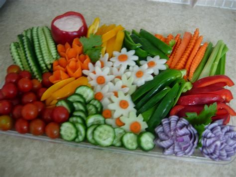 there are many different fruits and vegetables on the counter top ...