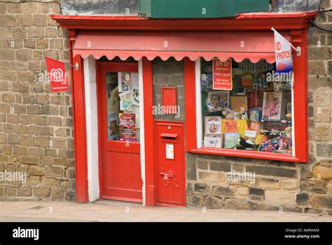 Old Post Office with red Georgian postbox and shop. Pateley Bridge ...