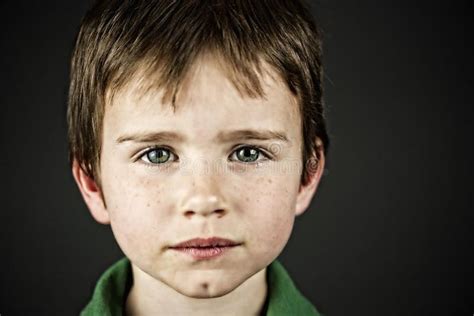 Boy with green eyes. Portrait of a young boy with bright green eyes , # ...