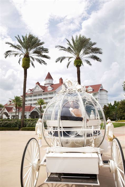 Disney Fairy Tale Wedding bride & groom ride in Cinderella's Carriage ...