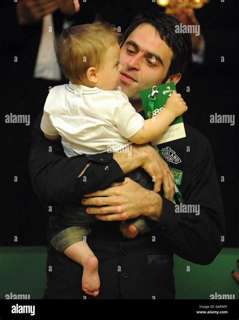 Ronnie O'Sullivan celebrates with his son Ronnie after winning the ...