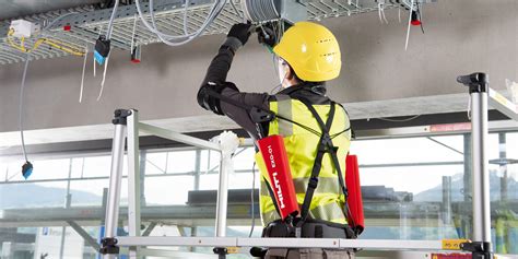 Construction exoskeleton takes the load when working overhead - Hilti ...