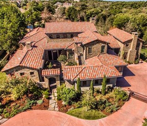 Architectural Designs Tuscan-Inspired Luxury House Plan 36522TX has an ...