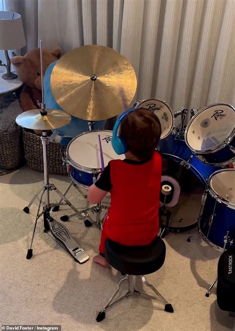 That's my boy! David Foster shows off toddler son Rennie's drumming ...