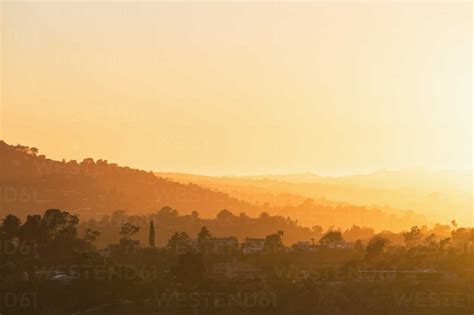 USA, California, Los Angeles, Villas in the Hollywood Hills at sunset ...