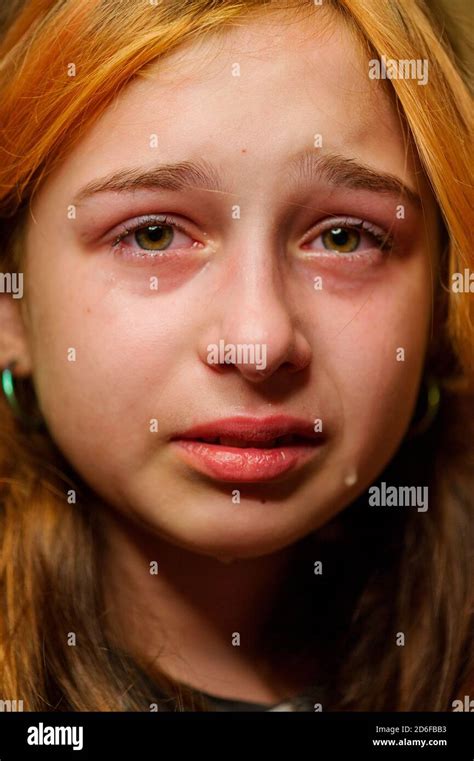 Portrait of little girl crying with tears rolling down her cheeks. Girl ...